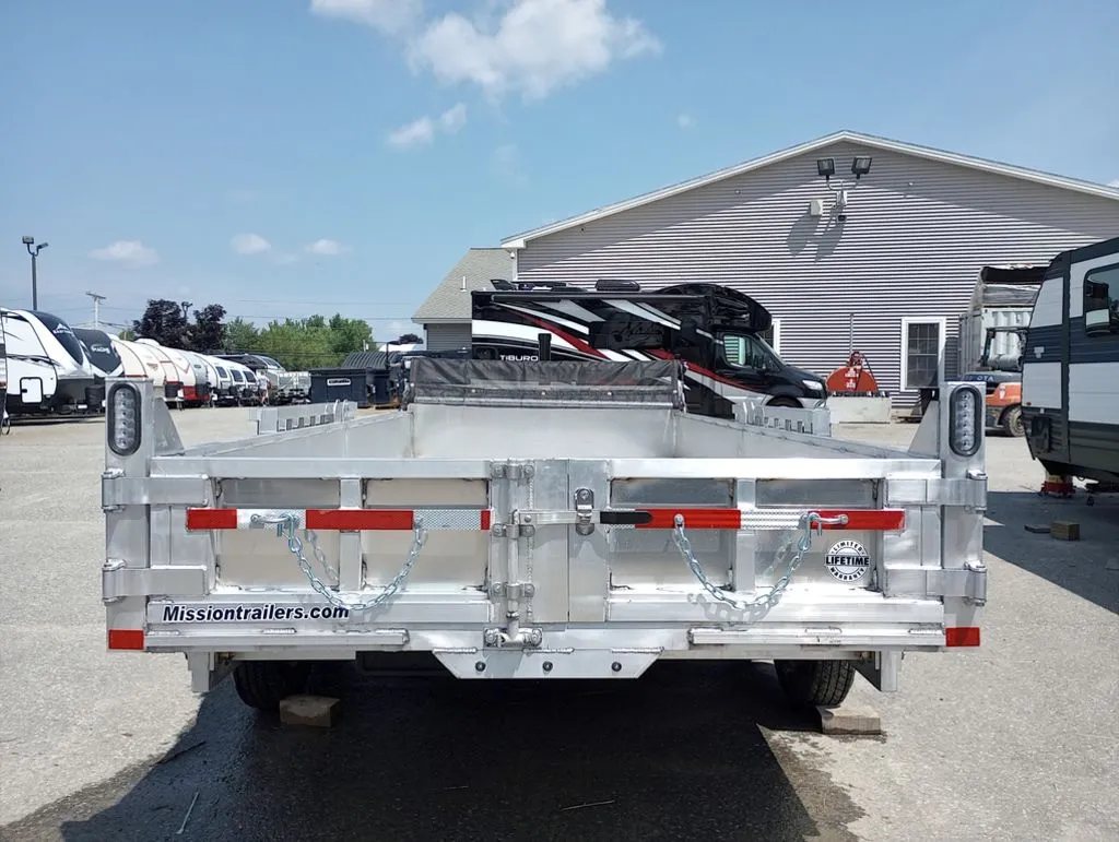 2025 Mission Trailers 16 ft Dump Trailer – Aluminum – Straight on rear view of the trailer showing the barn door latch system