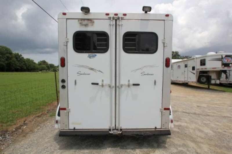2003 Sundowner 2 Horse Trailer – Dressing Room – Rear view of the trailer with closed double doors and windows