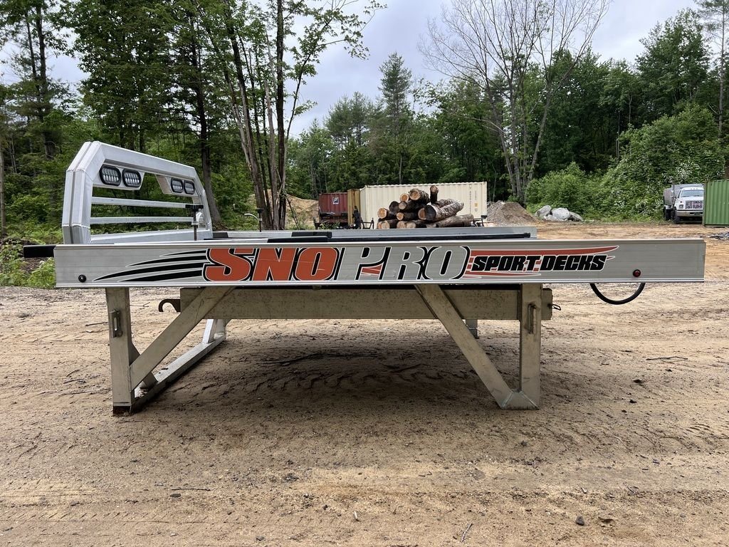 2022 Sno Pro 7 ft Sled Deck – Quad Ply Decking – Full side profile of the aluminum sled deck showing the brand decal