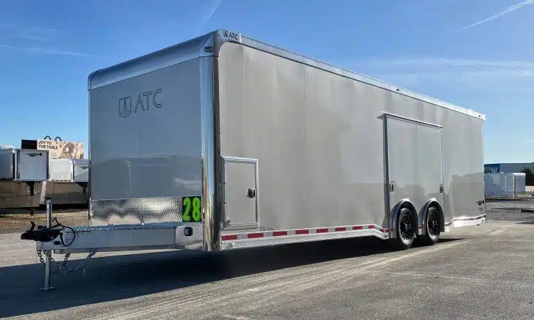 2026 ATC 28 ft Car Trailer – Silverfrost, LifeTrac – Silver enclosed trailer exterior three-quarter front view showing hitch and curbside doors