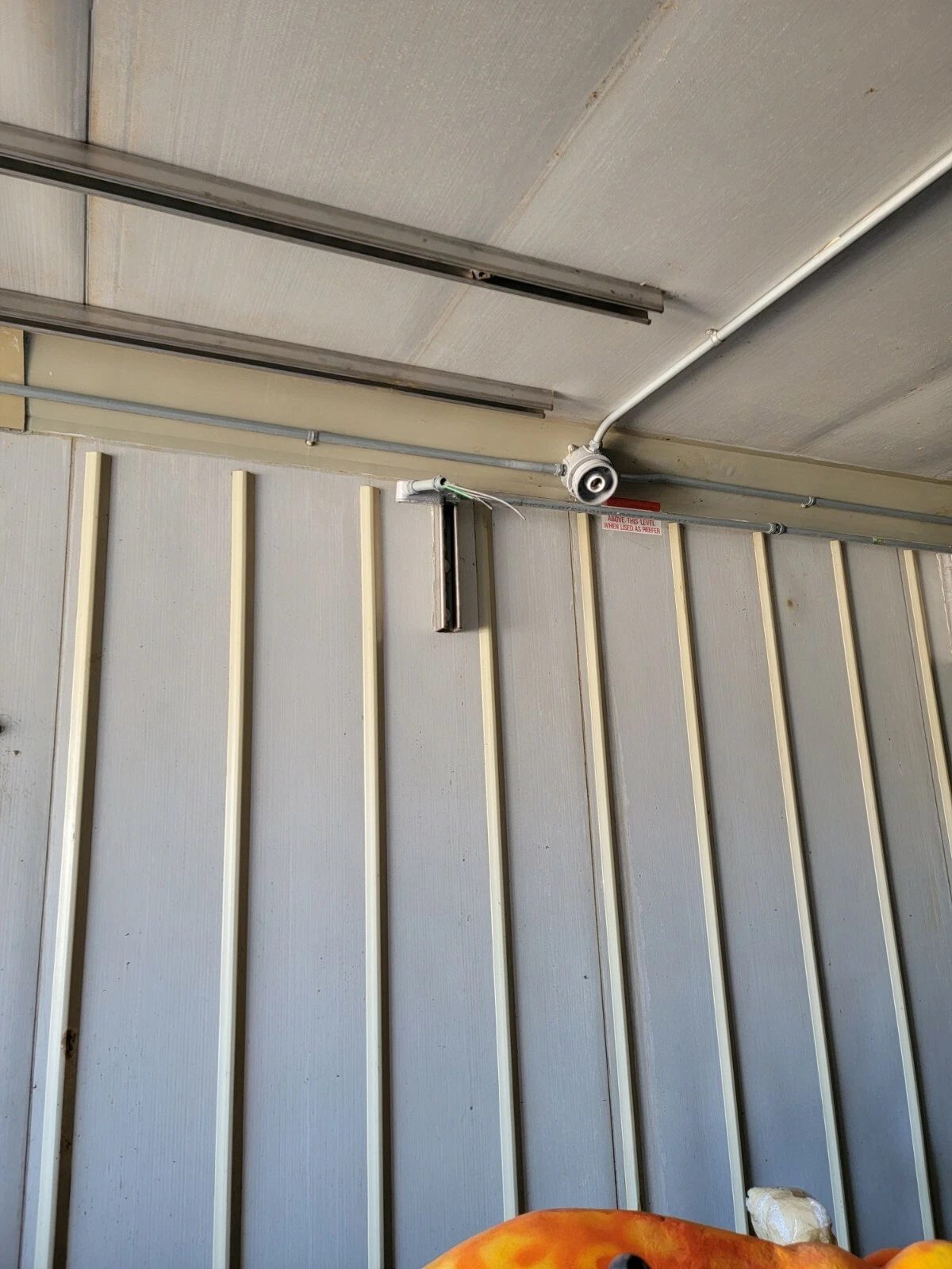 40ft As-Is Insulated Container – Electrical Connection – Interior insulated wall and ceiling with electrical conduit and exposed wires
