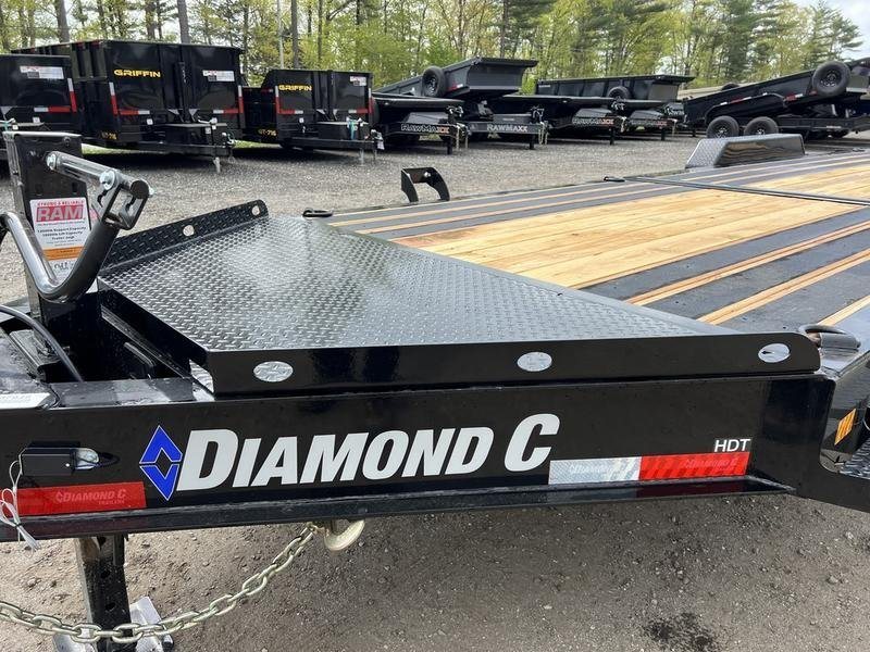 2024 Diamond C 24 ft Tilt Trailer – Spare Mount – Front diamond plate tool tray area and side rail markings on black frame