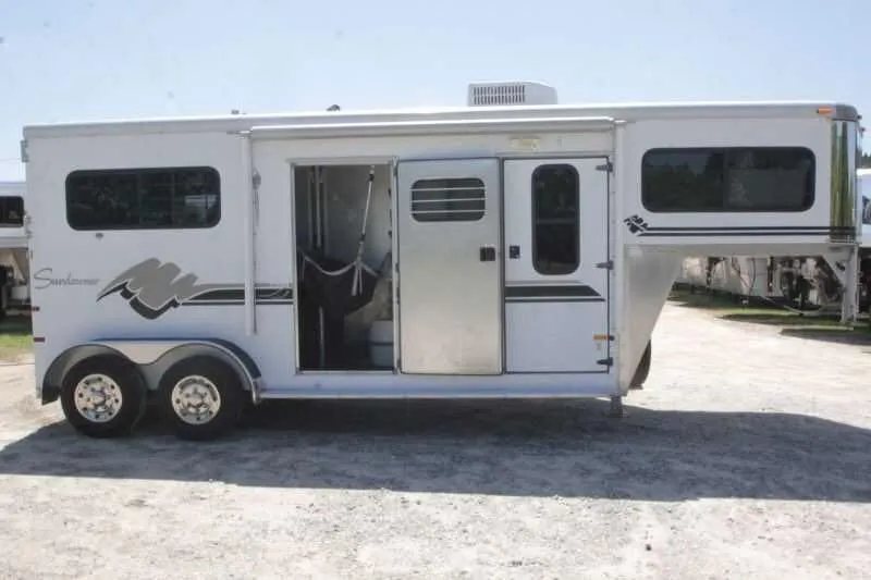 1999 Sundowner 20 ft Horse Trailer – Weekender – Passenger side of the trailer with side ramp and entry door open