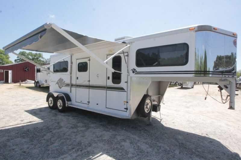 1999 Sundowner 20 ft Horse Trailer – Weekender – White gooseneck horse trailer with awning extended and side door open