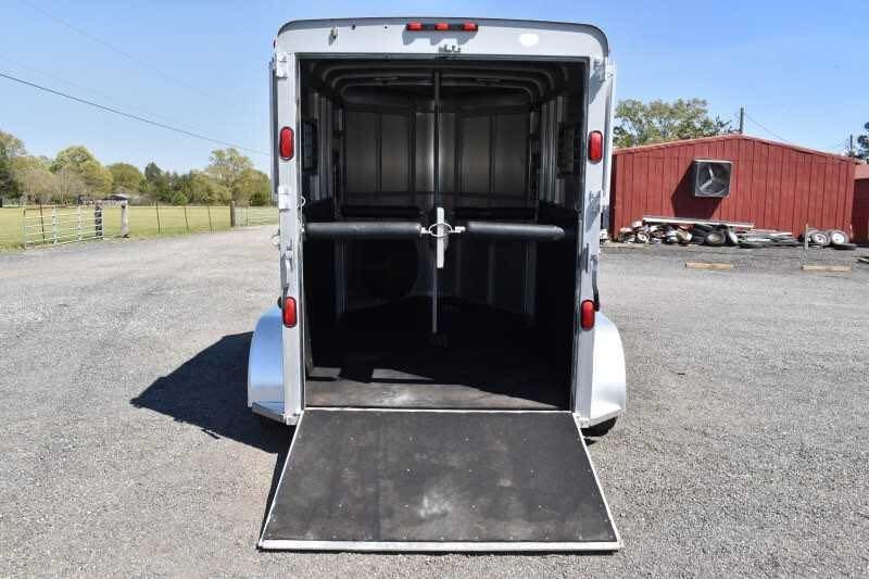 2004 Dalton 2 Horse Bumper Pull Trailer – Aluminum, Straight Load – Rear view of the trailer with the loading ramp lowered to the ground