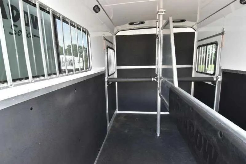 2016 Shadow 2 Horse Trailer – Aluminum, Dressing Room – Interior view from a different angle showing the padded stalls and metal bars