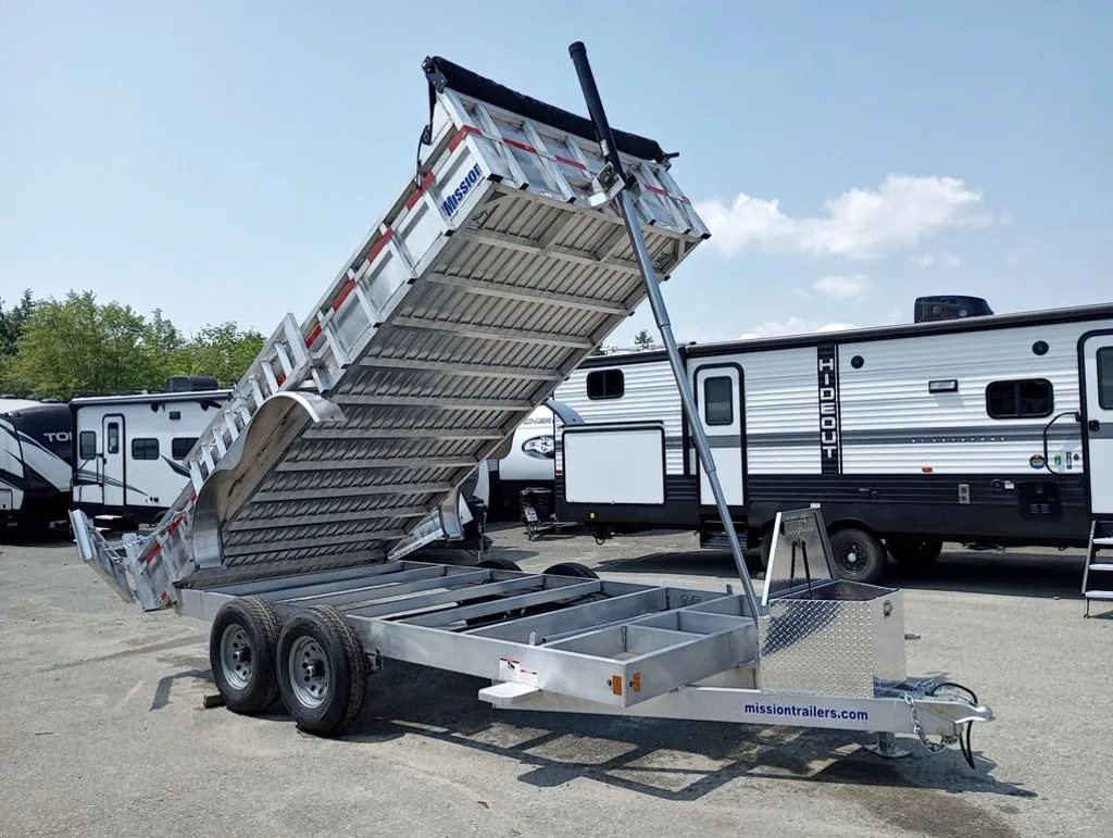2025 Mission Trailers 16 ft Dump Trailer – Aluminum – Side view of the trailer with the dump bed fully extended upwards