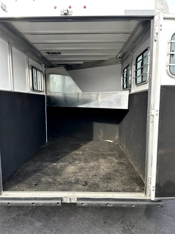 2021 Titan 2 Horse Bumper Pull Trailer – White, Slant Load – Wide view of the interior horse area through open rear doors