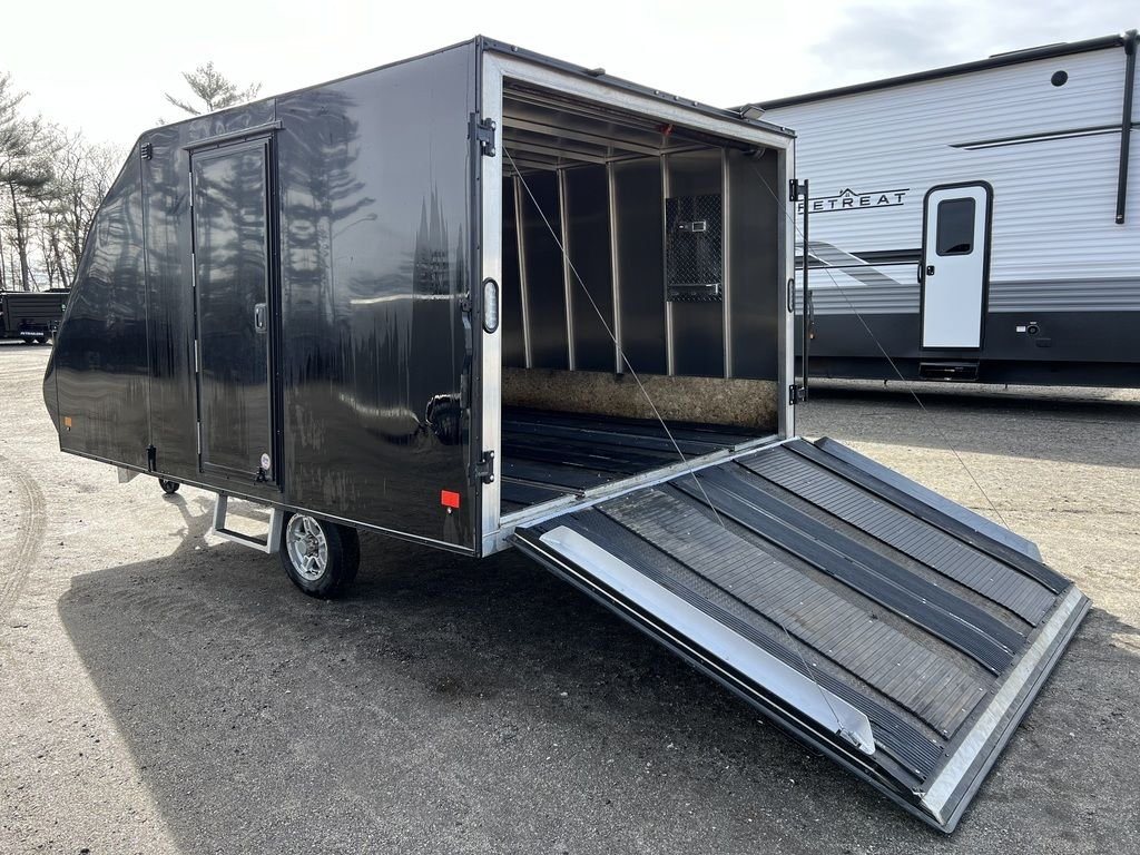 2021 Mission Trailers 2-Place Hybrid – Blackout Package – Rear three-quarter view with the rear ramp door fully open for loading
