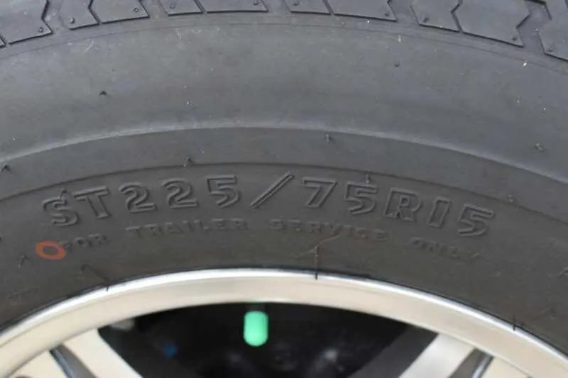 2018 Lakota 2HBPST 2 Horse Trailer – Dressing Room – Close-up view of the tire sidewall showing the size specifications