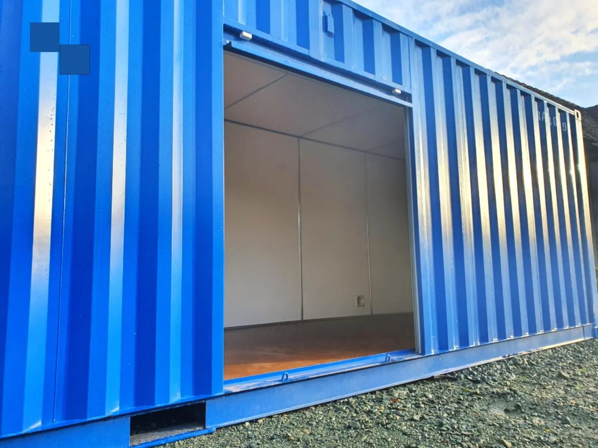 40ft High Cube Storage Container – Insulated, Plywood-Lined – blue container with open side entrance and lined interior