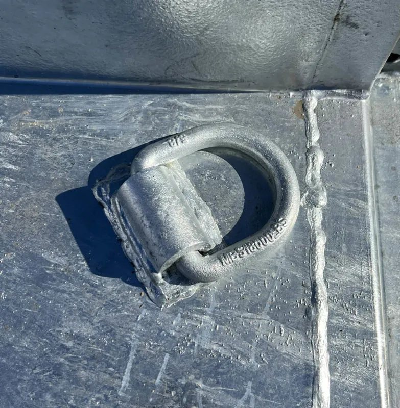 2024 N&N Trailers 14 ft Dump – Galvanized Steel – Metal D-ring tie-down point welded to the galvanized floor of the trailer