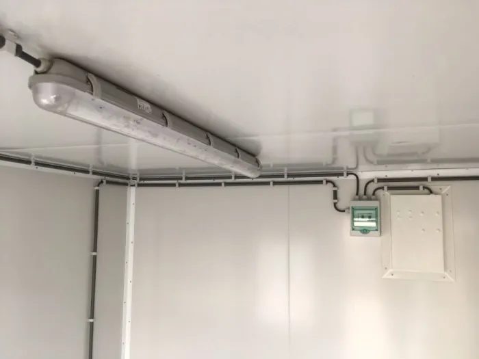 10ft Insulated Accommodation Container – Site Office – empty insulated interior with ceiling light and electrical conduits