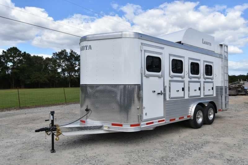 2018 Lakota 4 Horse Trailer – 2 ft Short Wall – Three-quarter exterior view of a white four horse trailer on a gravel lot