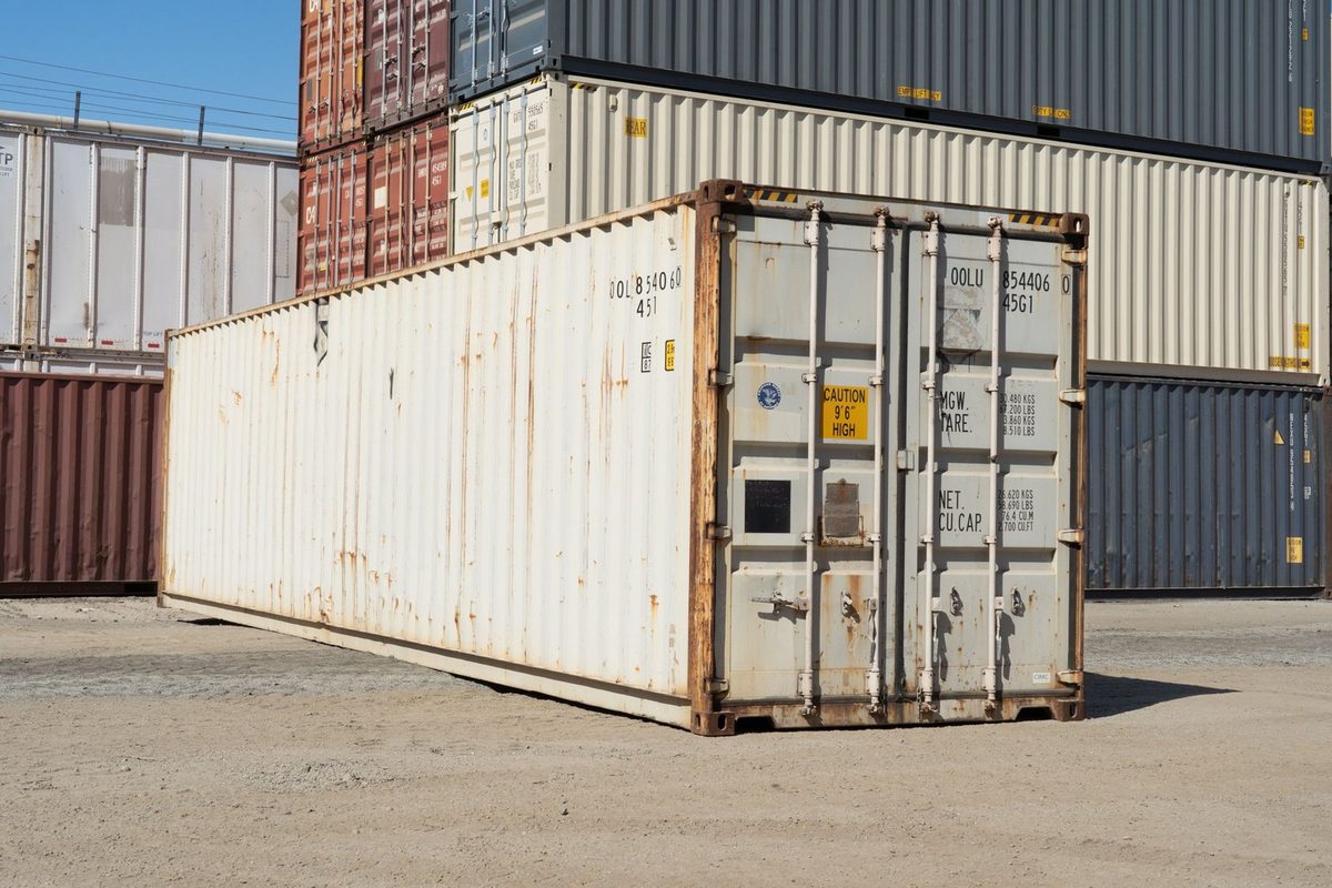 40ft Used High Cube Shipping Container – Storage Grade – three-quarter exterior view of weathered container with closed cargo doors