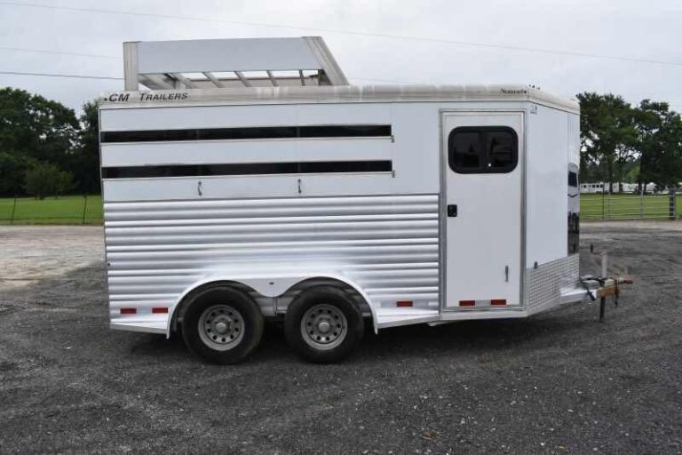 2012 CM 3 Horse Bumper Pull Trailer – Aluminum, Hayrack – Curb side view of the horse trailer featuring the tack room entry door