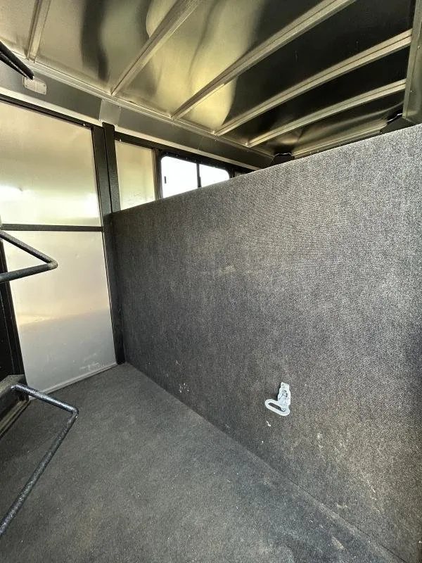 2022 Logan Coach Crossfire 3 Horse Trailer – Swing-Out Saddle Rack – Carpeted dressing room wall with tie down point and saddle rack base