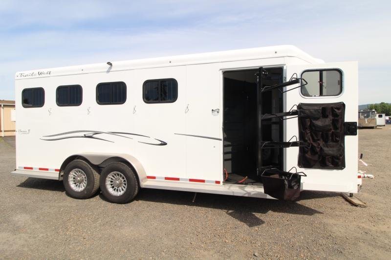 2019 Trails West 4 Horse Trailer – Convenience Package – Side view showing the open tack storage door with organizational accessories