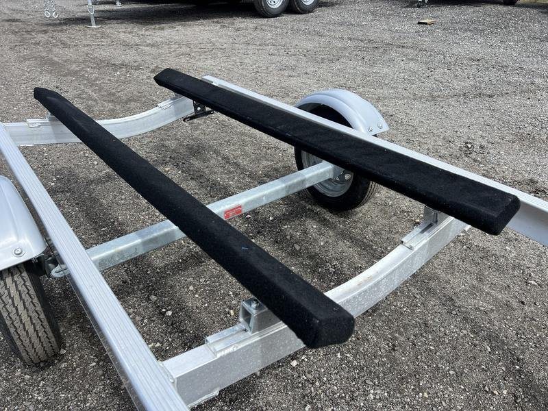 2020 Karavan Single-PWC Trailer – Aluminum, Adjustable Bunks – Close-up view of the adjustable carpeted bunks on the aluminum frame