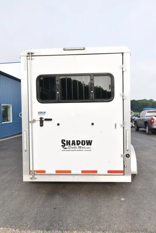 2021 Shadow 3 Horse Trailer – Fold-In Tack Wall – Direct rear view of the closed horse trailer door with a sliding window