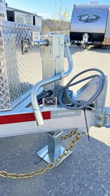 2024 N&N Trailers 14 ft Dump – Galvanized Steel – Close-up view of the front jack, safety chains, and electrical plug
