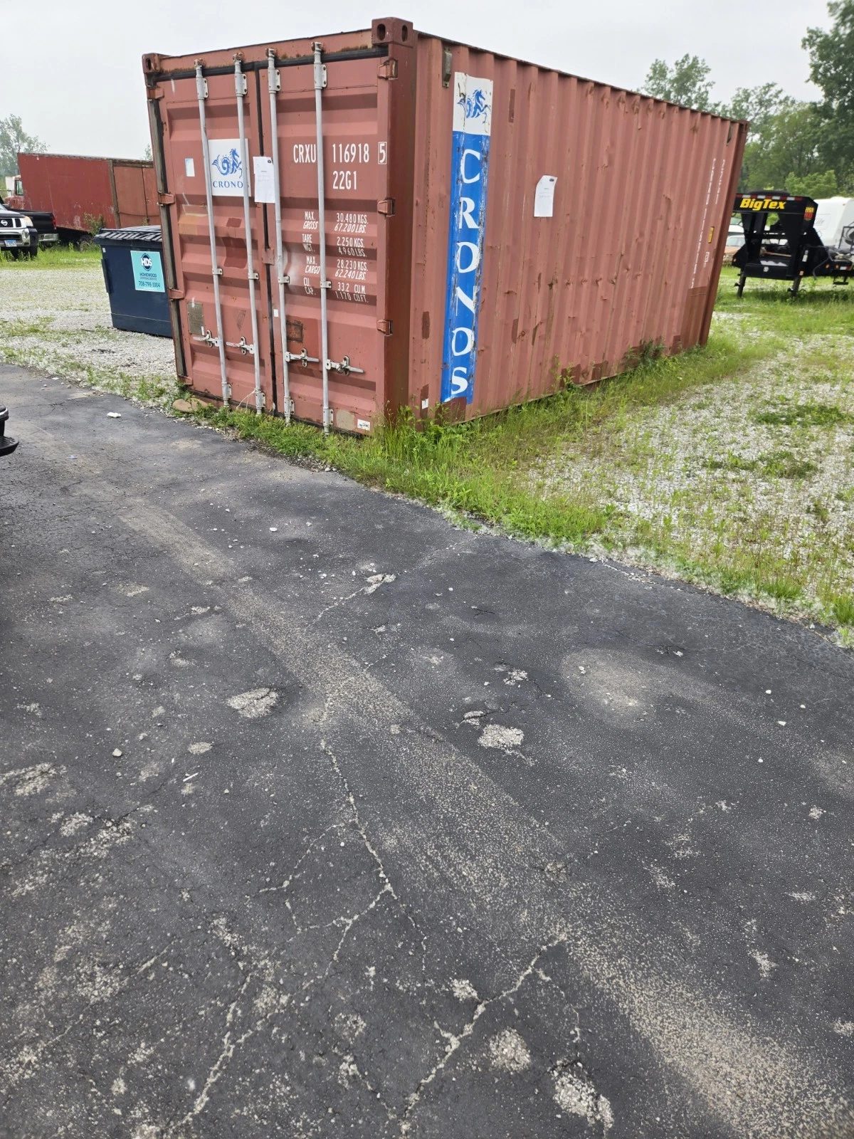 20ft Used Storage Container – Lockable Double Cargo Doors – three-quarter exterior view of weathered container with cargo doors closed (2)