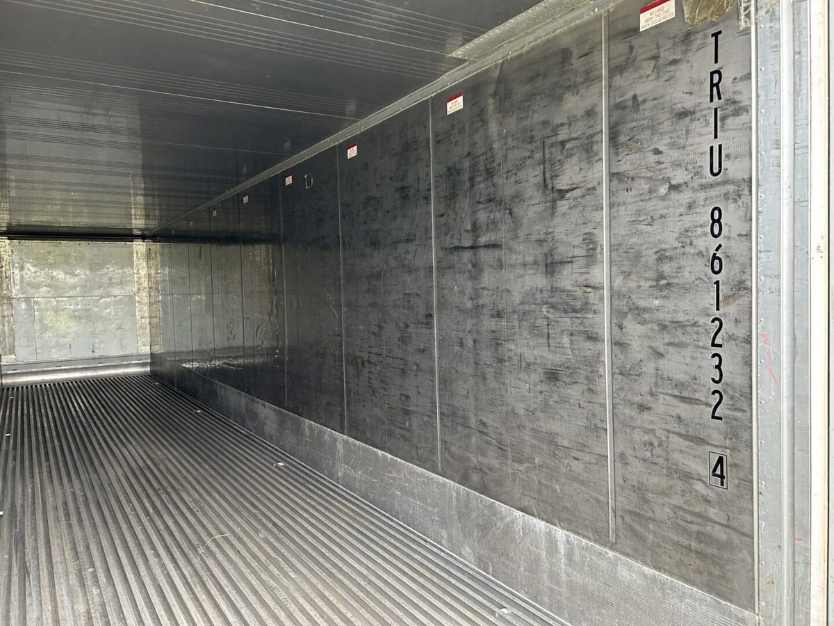 40ft High Cube Refrigerated Container – Insulated Storage – empty refrigerated container interior with ribbed floor and scuffed walls