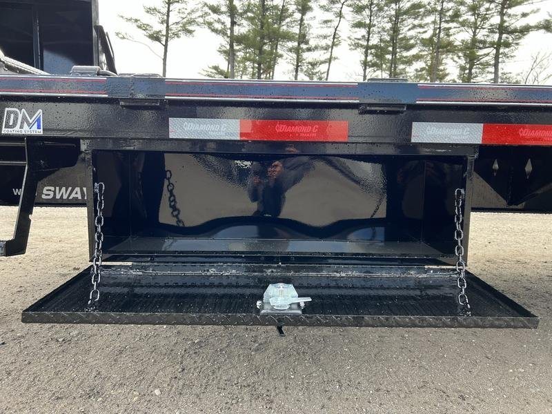 2024 Diamond C 35 ft Equipment Trailer – Auto Dovetail – Open side-mounted tool box showing the internal storage space