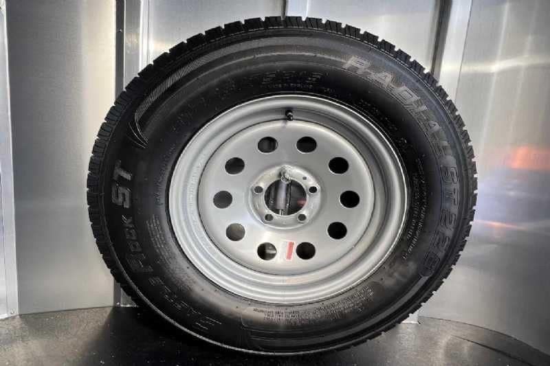 2024 Shadow 2 Horse Bumper Pull Trailer – Aluminum, Dressing Room – Close-up of a trailer wheel and tire assembly