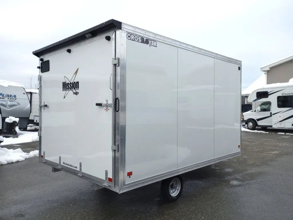 2024 Mission Trailers 12 ft Powersports – Side X Side – Rear corner view of the white trailer with the rear door closed