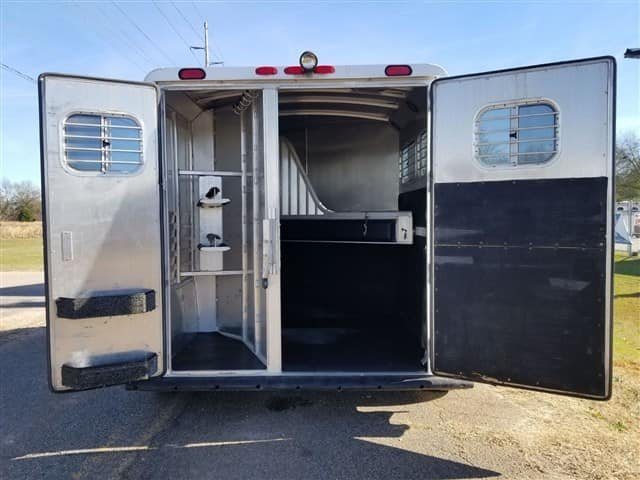 2001 4 Star 2 Horse Bumper Pull Trailer – Slant Load – Rear view of the horse trailer with both doors wide open showing interior