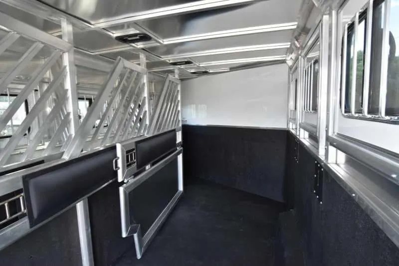 2018 Lakota 4 Horse Trailer – 2 ft Short Wall – Interior of the horse area showing padded dividers and rubber floor mats