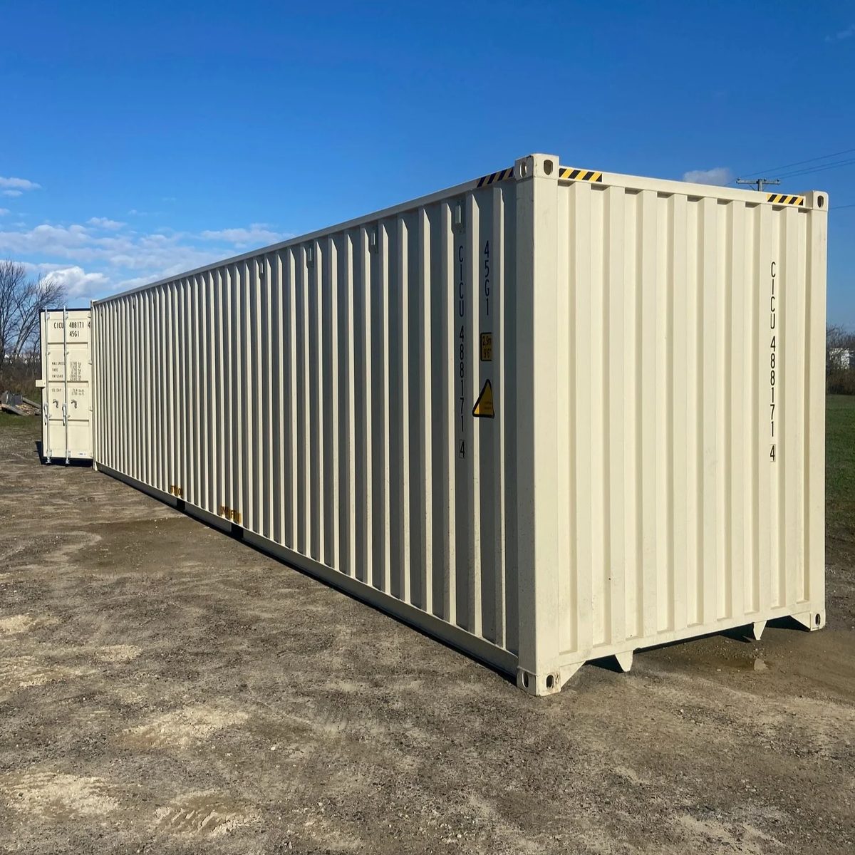 40ft High Cube Shipping Container – One-Trip, Double Cargo Doors – Three-quarter exterior view of container side and solid end