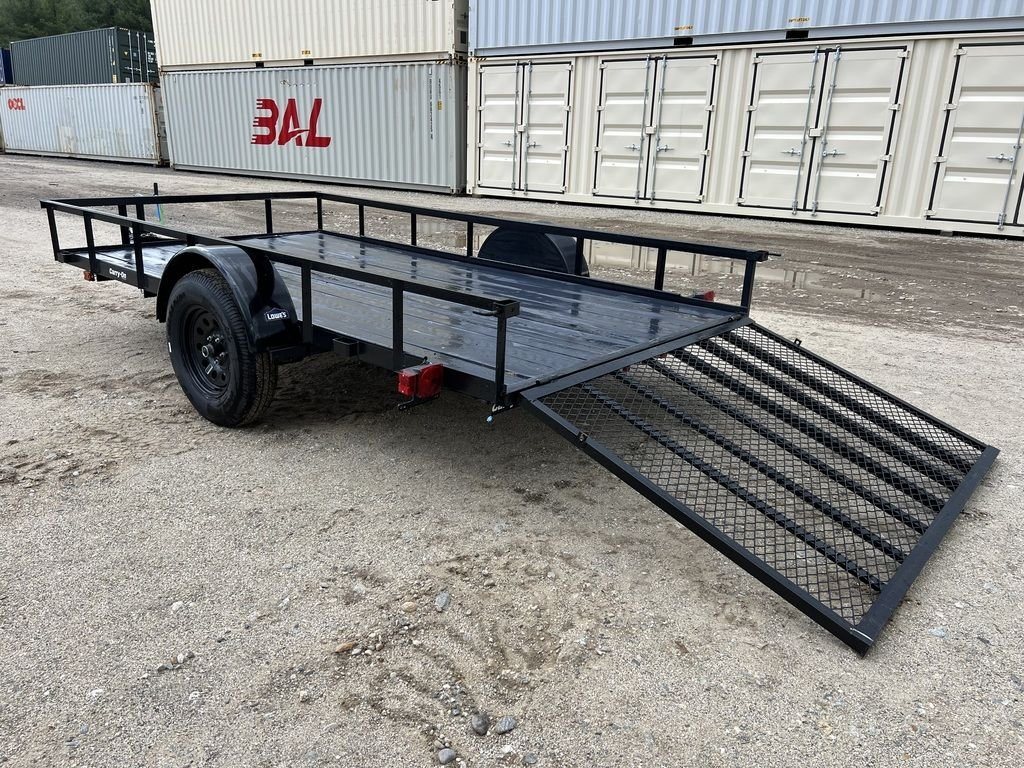 2024 Carry-On 12 ft Utility Trailer – Rear Ramp Gate – A rear three-quarter view of the trailer with the mesh ramp gate lowered