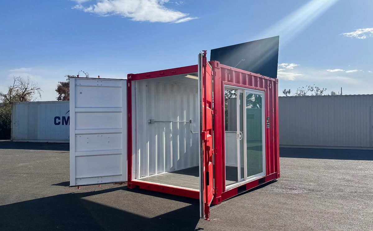 10ft Newly Built Concession Stand – Flip-Up Service Window – red concession container with open cargo doors and sliding glass entry