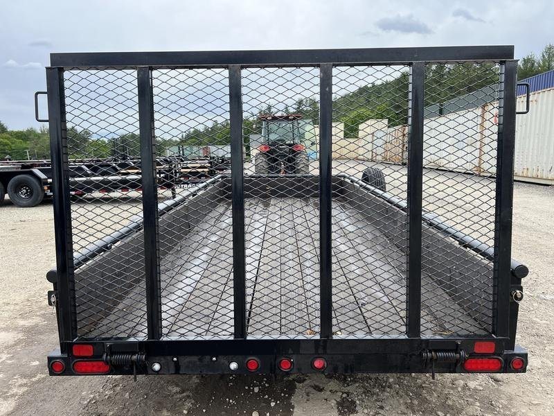 2021 Big Tex 16 ft Utility Trailer – Ramp Gate & Spare – Direct rear view of the upright mesh gate and trailer lighting system