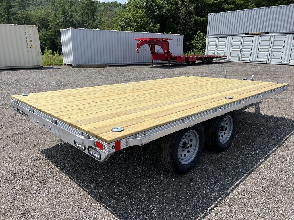 2024 Cargo Pro 101 in Deckover Trailer – Aluminum – A rear three-quarter view of the equipment trailer showing the wooden deck