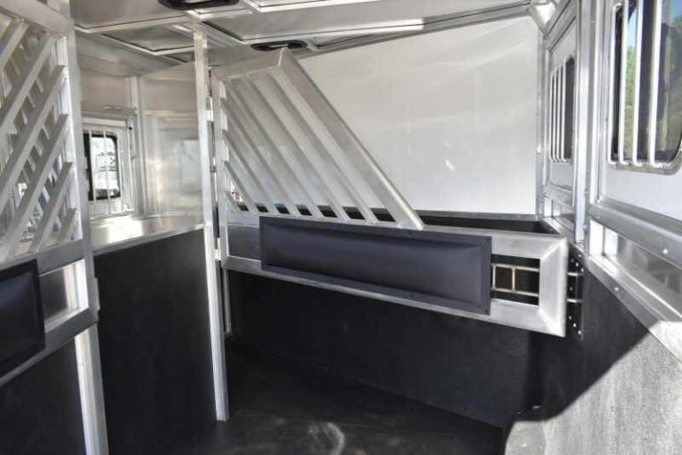 2018 Lakota 83HBPSL 3 Horse Trailer – Aluminum – Inside the horse trailer showing the wall mats and slatted dividers