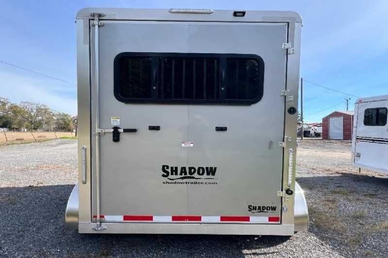 2024 Shadow 2 Horse Bumper Pull Trailer – Aluminum, Dressing Room – Rear view of the trailer with windows closed and latched