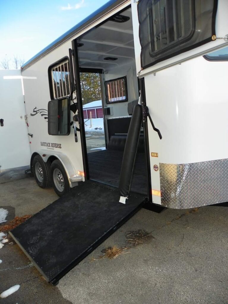 2022 Double D 2 Horse Bumper Pull – Reverse Slant – Angled view of the loading ramp leading into the horse trailer