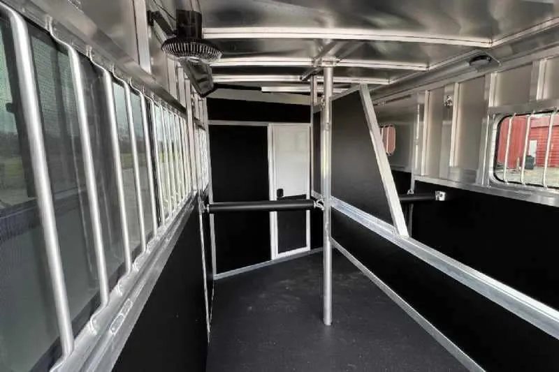 2023 Shadow 2HSSR 2 Horse Trailer – Extended Box – Horse stall interior with metal dividers and wall mounted fan