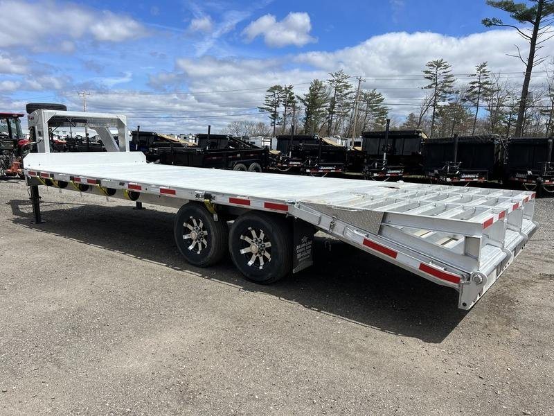 2024 Alum-Line 24 ft Gooseneck – Flip-Over Ramps – Rear three-quarter angle of the trailer with the flip-over ramps in stored position