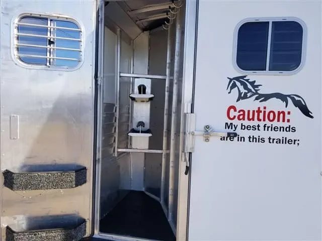 2001 4 Star 2 Horse Bumper Pull Trailer – Slant Load – Looking into the front tack room through the open rear interior door