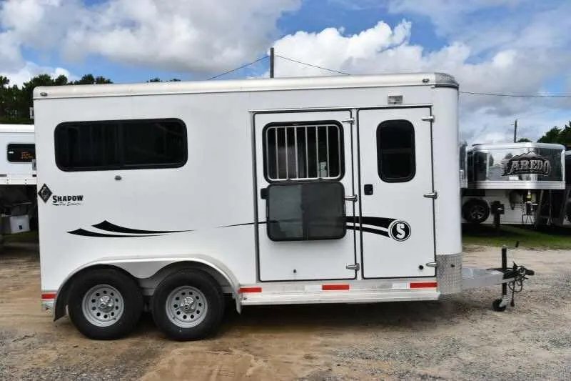 2016 Shadow 2 Horse Trailer – Aluminum, Dressing Room – Right side view of the trailer showing windows and the entry door