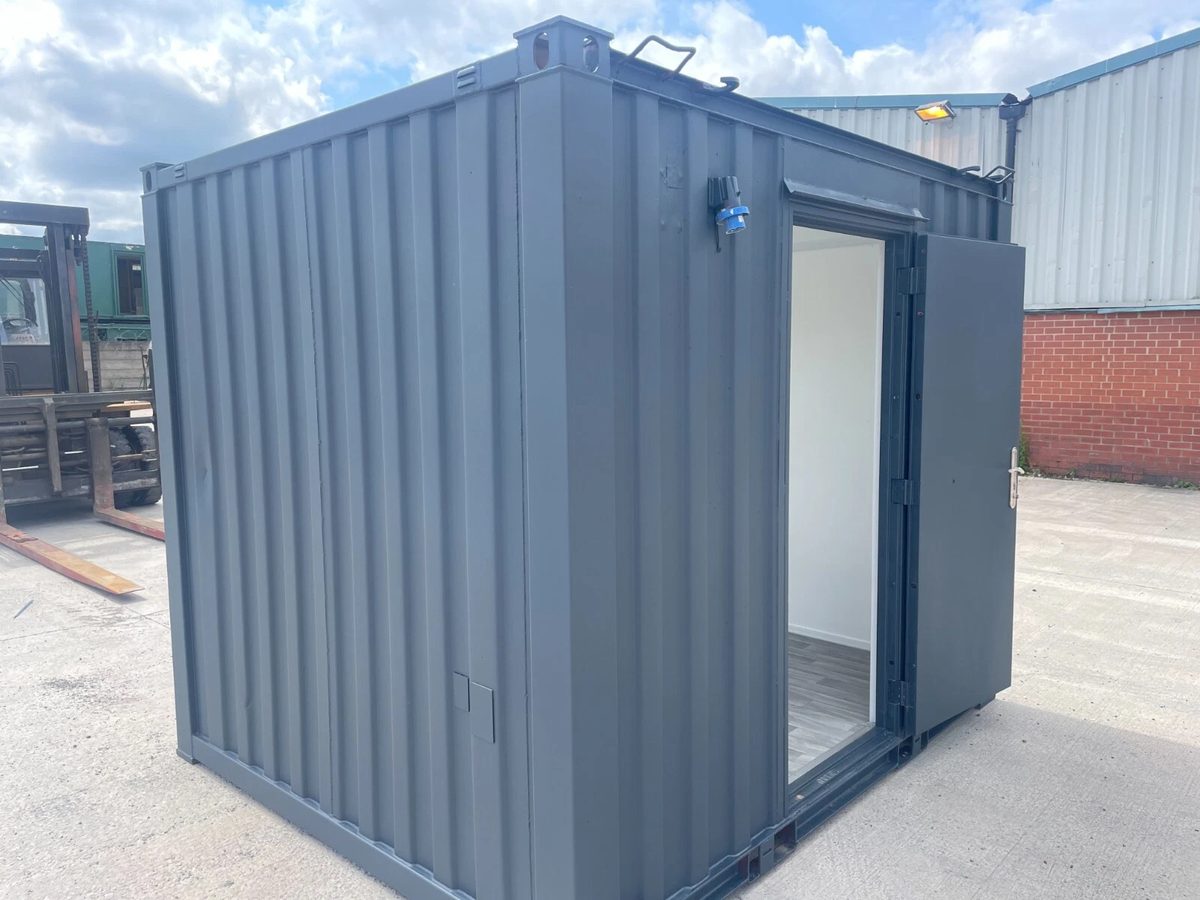 10ft Shipping Container – Unfitted Office Conversion Base – three-quarter exterior of office container with entry door open
