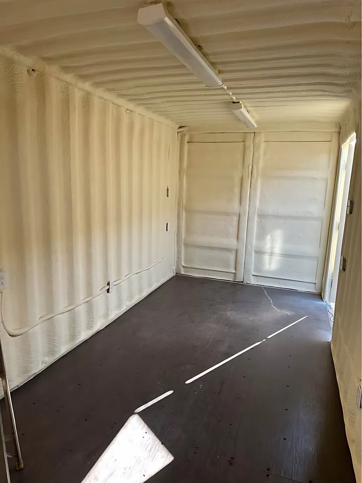 20ft/40ft Insulated Container Workspace – Lighting and Power – empty insulated container interior with ceiling lights and electrical outlets