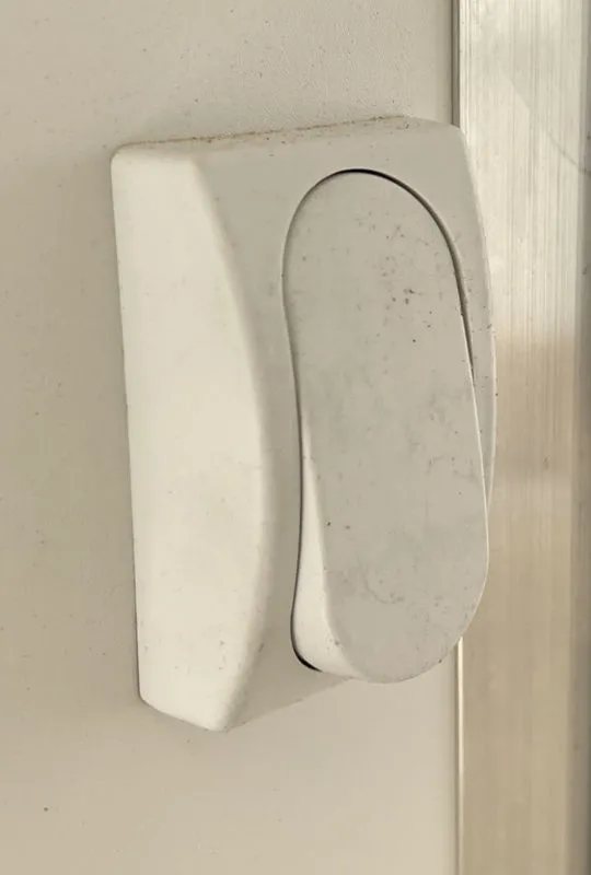 2023 High Country 14 ft Trailer – Blue, Drive-Through – A white plastic rocker light switch mounted on the interior wall