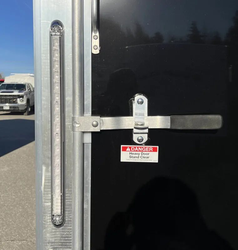 2024 Sno Pro 22 ft Snowmobile Trailer – Extra Height – Exterior vertical LED light bar and heavy duty door latch with danger sticker