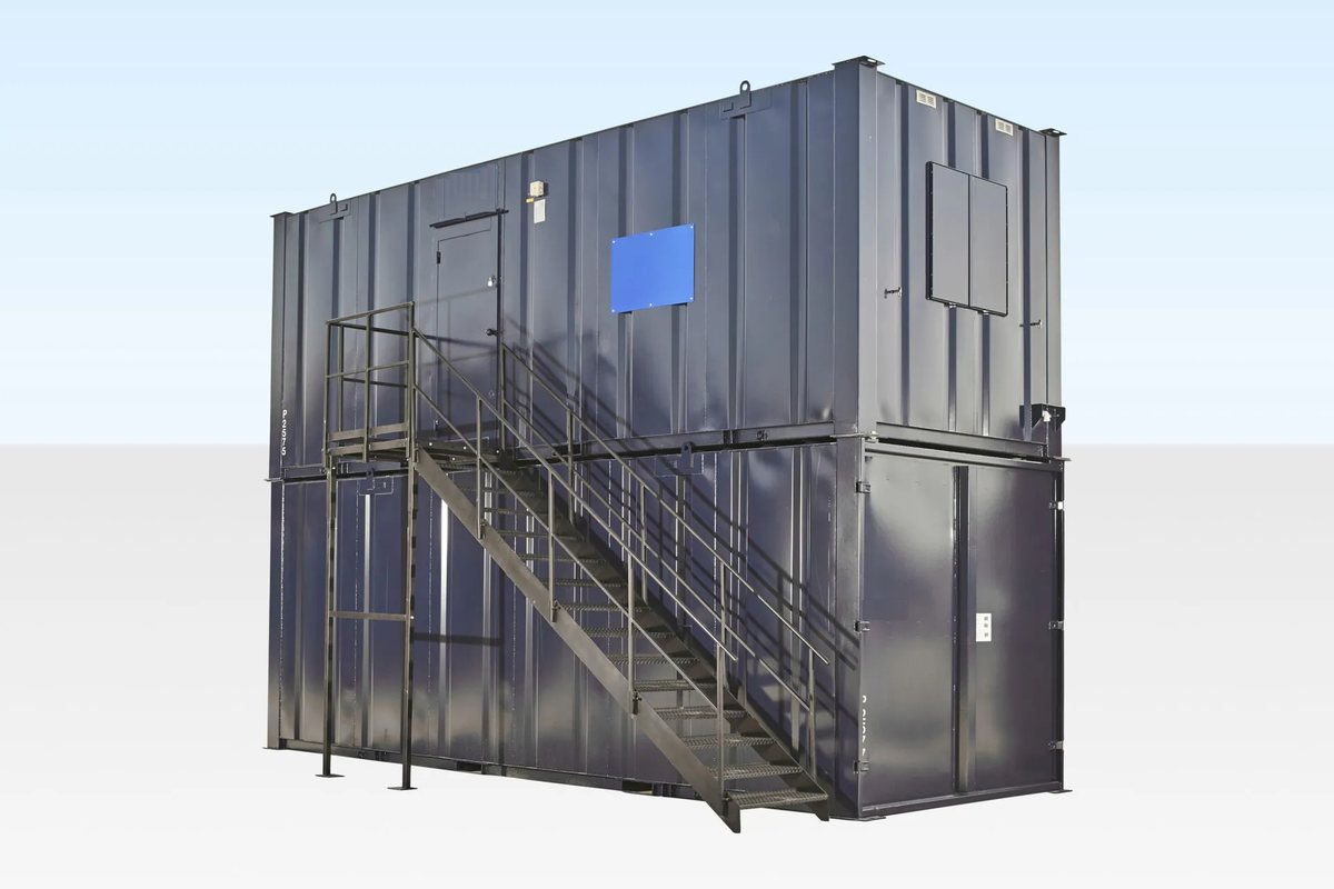 Steel Cabin Staircase – Black Finish, Landing & Handrails – Steel staircase with landing and handrails attached to a stacked modular building unit