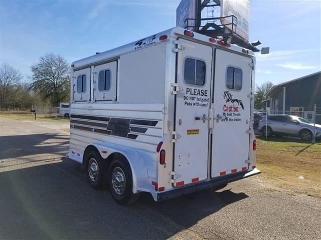 2001 4 Star 2 Horse Bumper Pull Trailer – Slant Load – Rear three-quarter view of the trailer showing the closed double rear doors